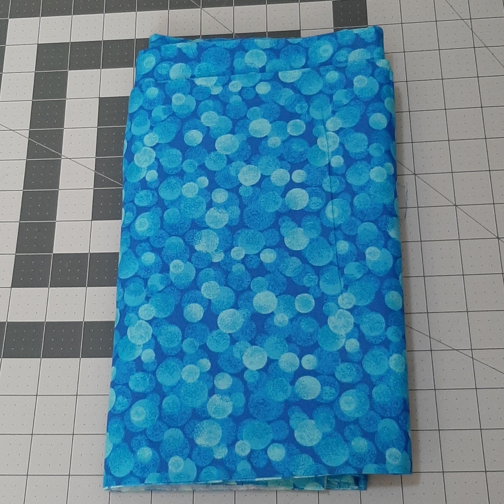 Blue fabric with spots/dots/bubbles